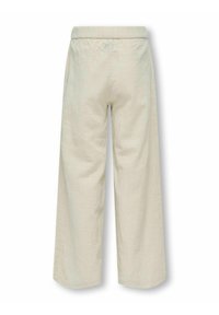 Vida byxor i ljust beige, tillverkade av texturerat tyg med elastisk midja och rynkad detalj bak.