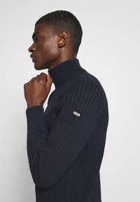 Schott PLECORAGE - Striktrøje - navy