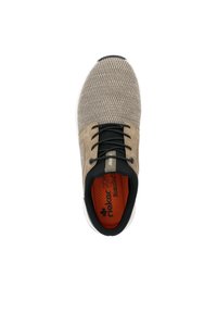 Beige athletic shoe with mesh upper, black accents, and white sole. Features black laces and an orange insole with logo detailing.
