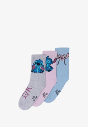 Drei Paar Baumwollsocken in Grau, Pink und Hellblau mit Cartoon-Charakterdesigns und gestickten Akzenten.