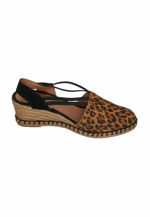 Wedge espadrille shoe with leopard print front, black straps, and woven jute sole designed for casual wear.