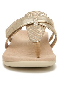 Gold-tone flip-flop sandal with woven strap detail, soft beige footbed, and flexible outsole. Simple design with a sleek finish.