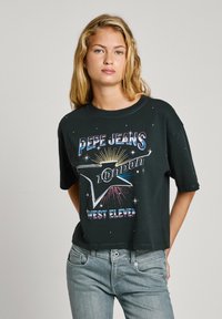Black cropped t-shirt made of cotton featuring multicolored printed text "PEPE JEANS LONDON" and graphics, with a relaxed fit and short sleeves.