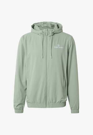 Světle zelená kapucí opatřená bunda na zip s elastickými manžetami a lemem, šňůrkami, postranními kapsami a logem "Sergio Tacchini" na hrudi.