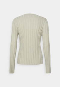 Ljusgrön ribbad långärmad topp med rund halsringning, som har en figurnära design och texturerad tyg genom hela plagget.
