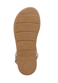 VIONIC sandal sole, tan rubber with textured ridges for traction. Features logo at the center. Flat, wide design for comfort.