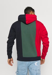 Karl Kani SIGNATURE BLOCK HOODIE - Kapuzenpullover - grey/navy/white