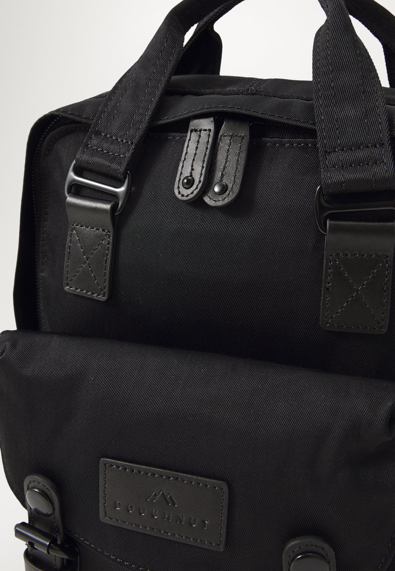 doughnut macaroon mini backpack in black Doughnut MACAROON MINI SERIES BACKPACK UNISEX - Rucksack - black