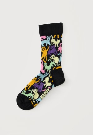 Chaussette noire avec des motifs de chats colorés en bleu, jaune, violet, rose et vert, avec le mot "HAPPY" près des orteils.