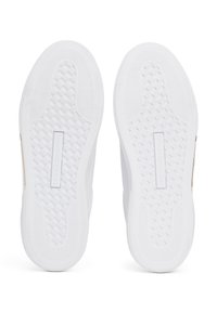 Paire de semelles de baskets blanches avec des motifs de grip texturés et le nom de la marque « Tommy Hilfiger » embossé au centre.