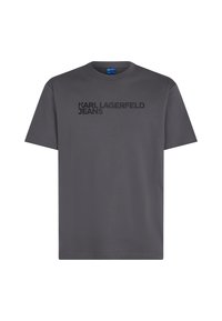 Szara bawełniana koszulka z krótkim rękawem, okrągłym dekoltem i napisem "KARL LAGERFELD JEANS" w bold czcionką na wysokości klatki piersiowej.