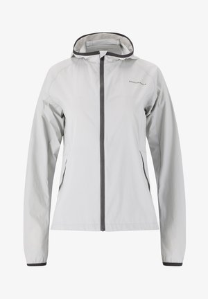 Hellgraue Windjacke mit Kapuze, Reißverschluss vorne, elastischen Bündchen und Seitentaschen; aus leichtem, wasserabweisendem Material gefertigt.
