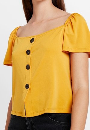 T-shirt print - mustard yellow