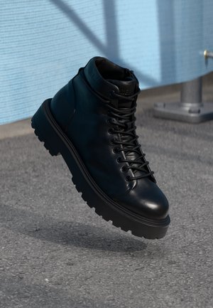 URANUS MOUNT - Botines con cordones - black