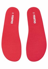 Sole rosse con l'etichetta "reima" e la taglia "33" stampata in bianco, dotate di una superficie piatta e testurizzata per comfort e supporto.