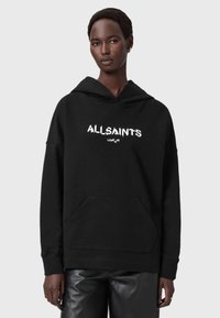 Felpa nera con cappuccio e tasca frontale, caratterizzata dal testo "ALLSAINTS LONDON" in bianco. Tessuto morbido e strutturato, vestibilità oversize.