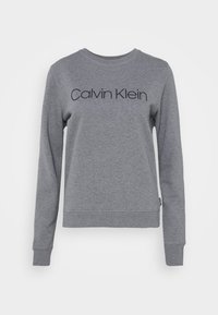 Sudadera gris de tejido mezcla de algodón, con cuello redondo, mangas largas y el logo 'Calvin Klein' en negro en el pecho.