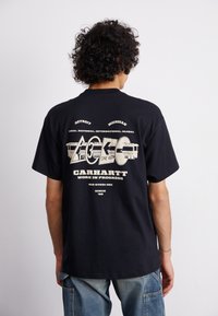 Carhartt WIP RUNAWAY - T-shirts med print - black/wax