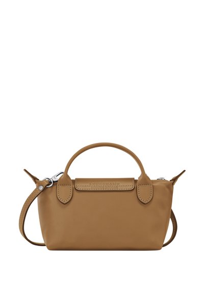 Tan leather handbag with a structured design, short handles, and a detachable shoulder strap. Features embossed brand logo and stitching details.