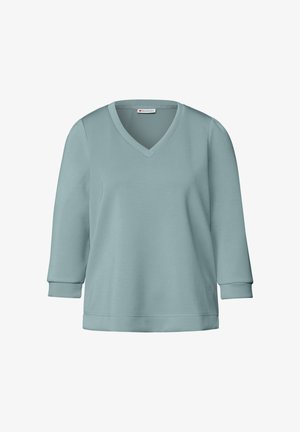 Hellblaues V-Ausschnitt-Sweatshirt mit Dreiviertelärmeln, weichem Material und lässiger Passform. Einfaches Design ohne sichtbare Muster oder Akzente.