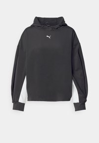 Sudadera con capucha negra hecha de una tela suave, con paneles laterales blancos y un logo sutil en el pecho. Corte holgado y mangas largas.