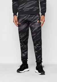 Venum UFC FIGHT WEEK JOGGERS - Dresside alumine osa - urban camo