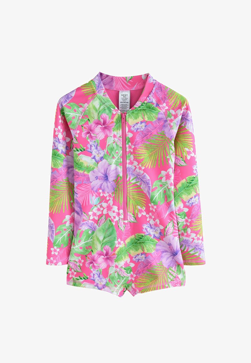 Maillot de bain zippé à manches longues en rose vif, avec des motifs tropicaux de fleurs et de feuilles en vert, violet et blanc. Tissu lisse et extensible.