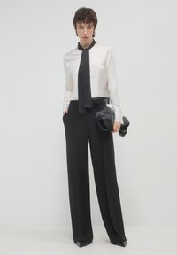 Calliope PALAZZO FASCIA  - Pantaloni - nero