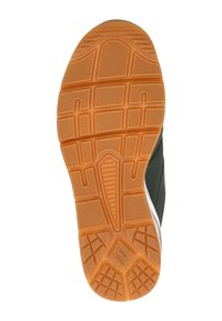 Sula av sko med ett mönstrat mönster; orange gummi med upphöjda texturer och delningarna; grå övre del som är delvis synlig.