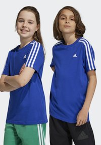 adidas Performance TEE - Camiseta estampada - semi lucid blue/white