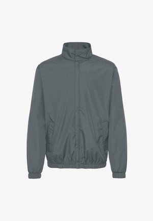Gray lightweight jacket with a high collar, zip front, elastic cuffs, and side pockets. Smooth material with a slight sheen.