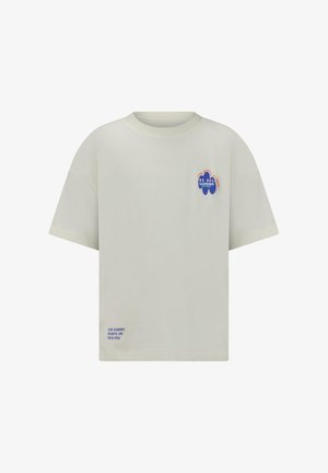 Light beige cotton t-shirt with a round neck, short sleeves, front logo in blue and red, and text detail in blue on the lower hem.