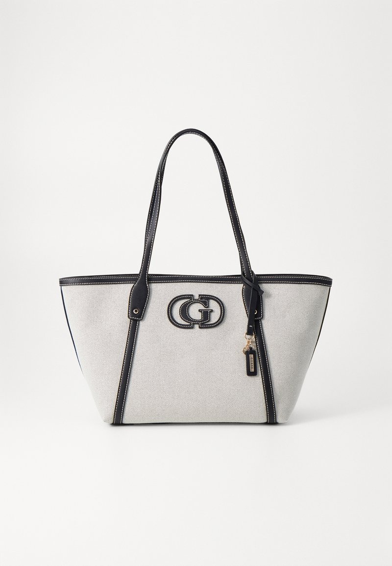 Sac fourre-tout en toile de couleur gris clair avec des accents en cuir bleu marine, arborant un logo double 'G' bien en vue et deux anses.