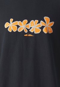 Black cotton t-shirt featuring a design of five large orange flowers with white outlines and a small orange logo. Smooth texture.