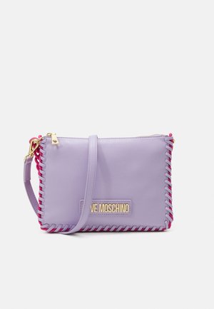Lilac leather crossbody bag with pink braided accents and gold hardware. Features a branded plaque and a zip closure. Compact rectangular shape.
