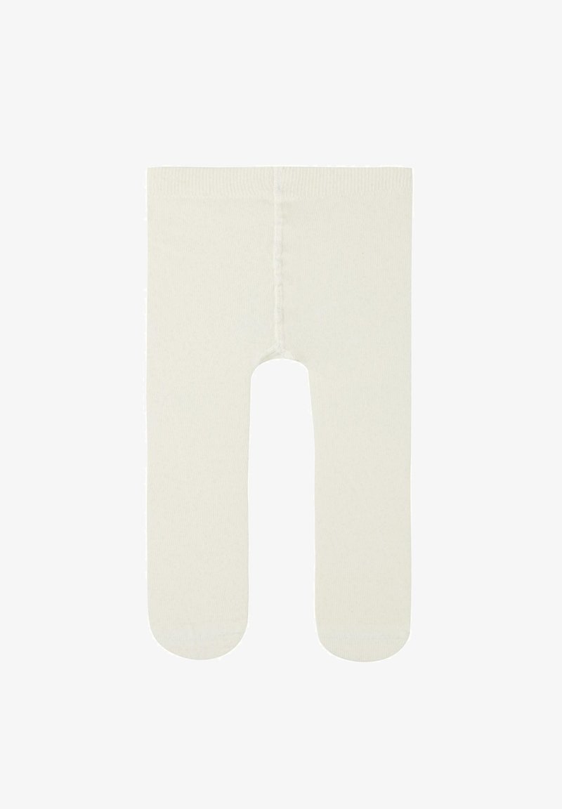 Kremowe legginsy bez stóp, o gładkiej fakturze i elastycznym pasku w talii. Posiadają szew biegnący wzdłuż pleców. Idealne do noszenia w warstwach.