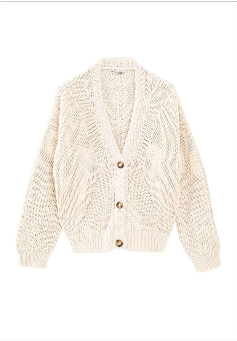 Beżowy dziany kardigan z dekoltem w serek, zapinany na guziki, z prążkowanym dołem. Posiada teksturowany wzór oraz długie, lekko bufiaste rękawy.