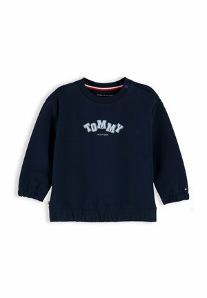 Navyblauer Langarm-Sweatshirt für Kleinkinder mit dem Text "Tommy Hilfiger" auf der Vorderseite sowie elastischen Bündchen und Saum.