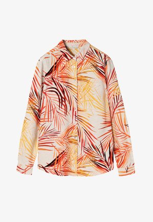 Lühikeste varrukatega heledast beežist särgil on erksavärviline palmilehtede muster punases, oranžis ja kollases. Särgil on nööpidega eesmine osa.