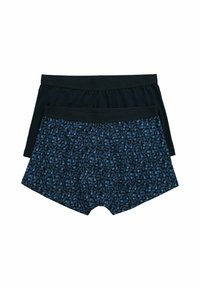 Dvě soupravy boxerky: jedny jednobarevné černé a jedny s modrým květinovým vzorem na tmavém pozadí. Každé mají černý pás.