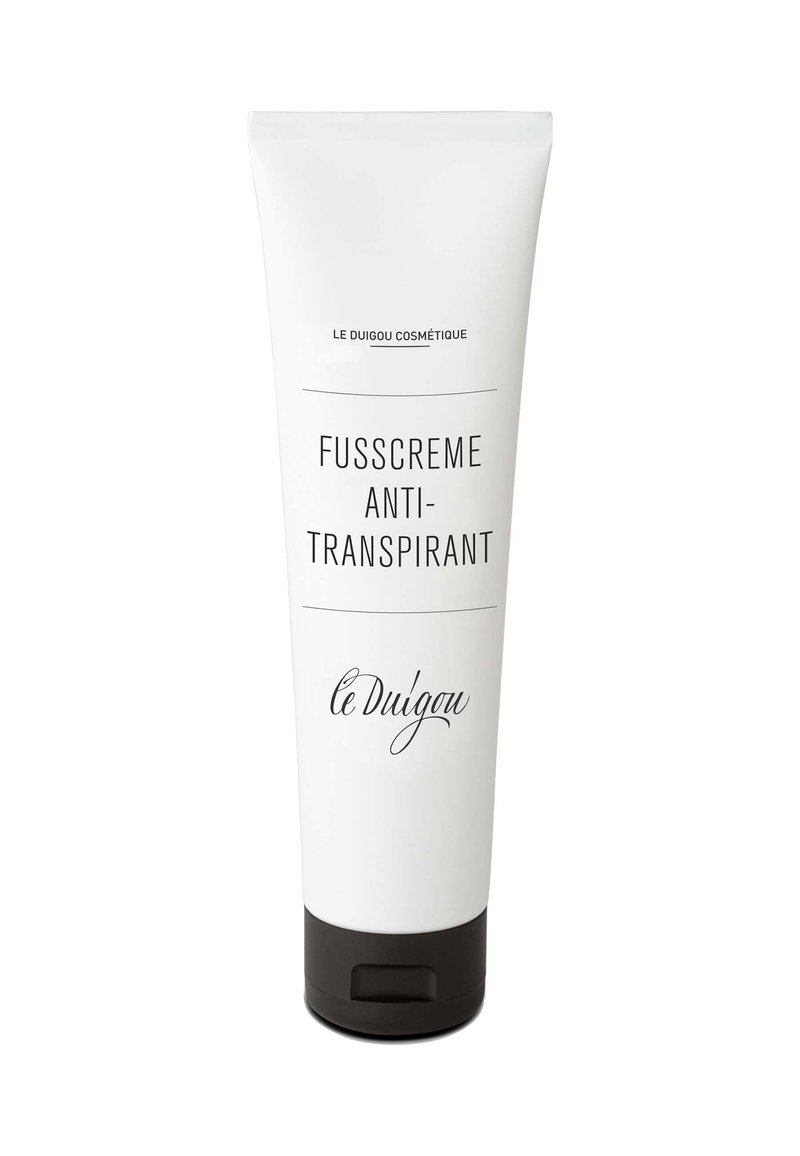 Weißer Tubus mit schwarzer Kappe, beschriftet mit "Fusscreme Anti-Transpirant" und "le Duigou Cosmétiqu", verfügt über einfachen schwarzen Text und ein minimales Design.