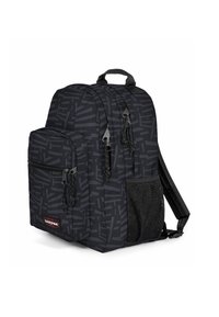 Sac à dos noir avec un motif géométrique, doté de deux poches zippées, de bretelles réglables et d'une poche latérale en mesh.
