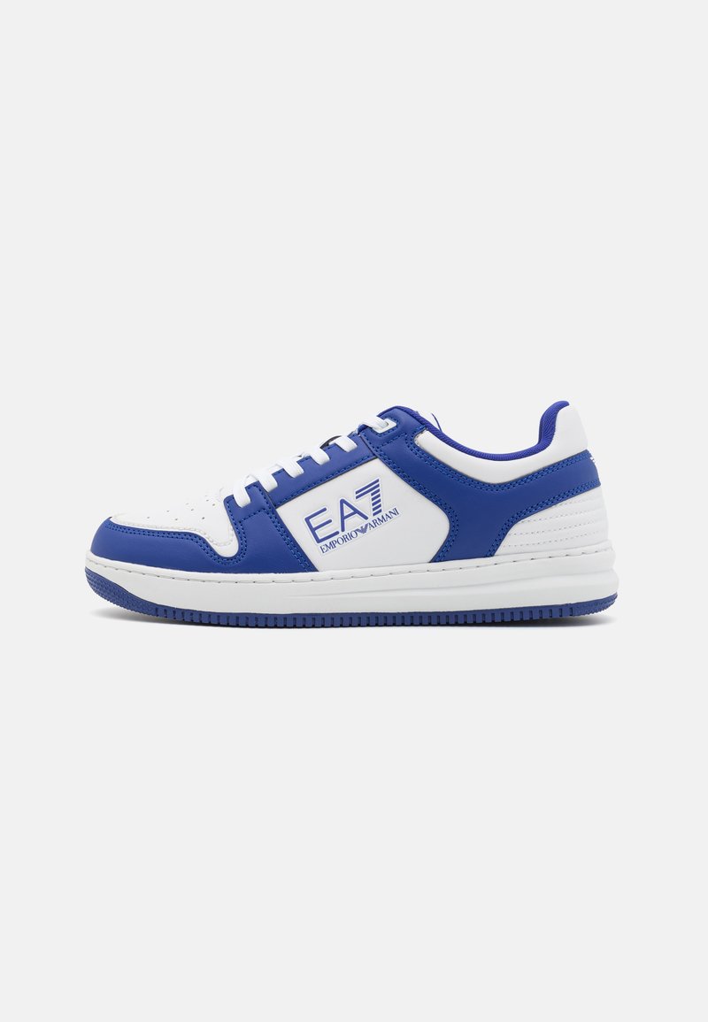 Blue and white sneakers with leather upper, perforated toe, logo detail on the side, and textured rubber outsole. Lace-up closure.