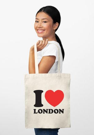 Torbę zakupową z płótna w naturalnym kolorze z czarnym napisem "I" oraz "LONDON", a pomiędzy nimi czerwona forma serca. Posiada mocne ramiączka na ramię.