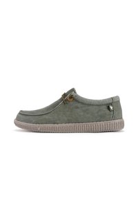 Light green suede slip-on shoe with a rounded toe, textured rubber sole, and decorative round lacing detail.