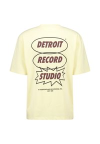 Yellow cotton t-shirt featuring a large graphic print on the back with the text "DETROIT RECORD STUDIO" in maroon and black accents.
