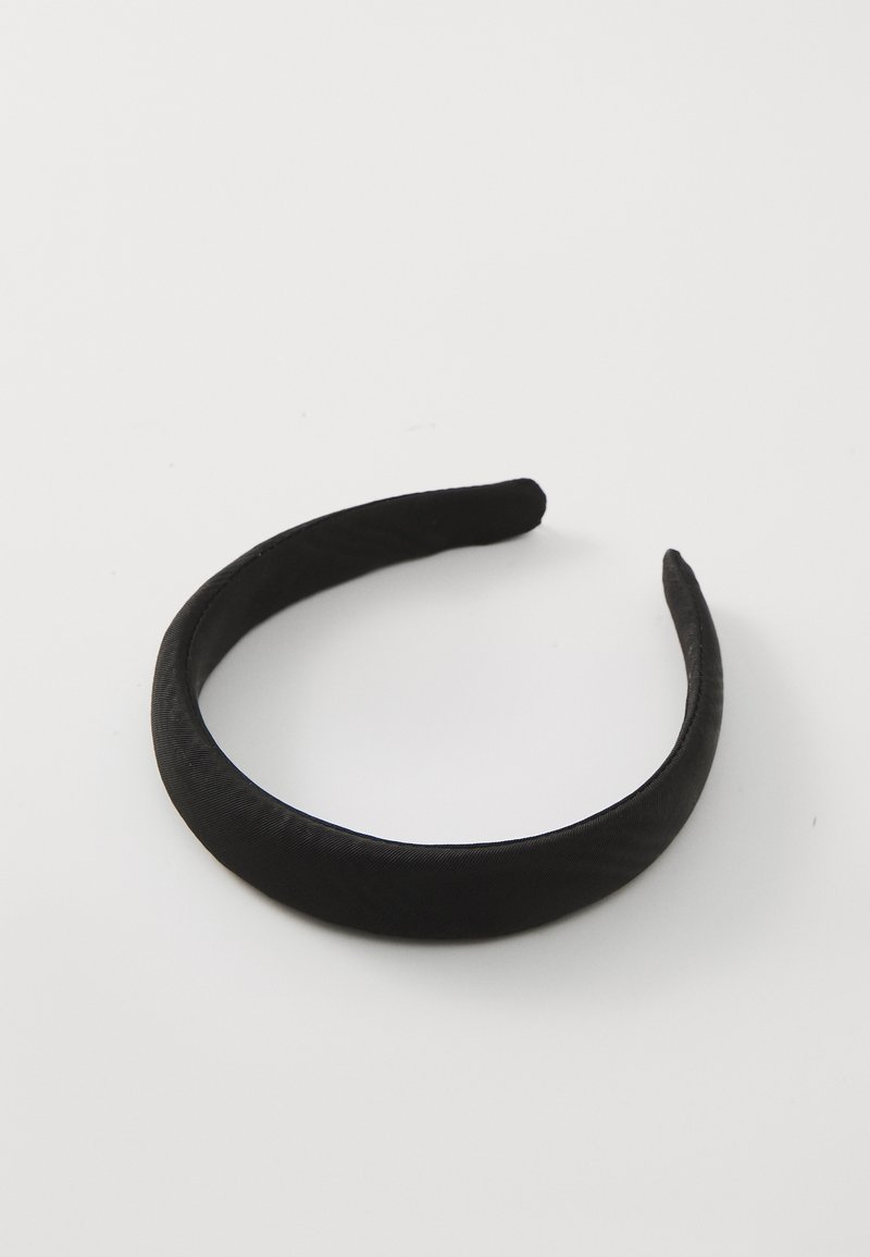 Black fabric headband with a smooth texture, round shape, and a simple design. Suitable for hair styling and holding hair in place.