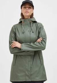 Green waterproof rain jacket with a hood, front snap closure, adjustable drawstrings, and side pockets. Smooth, shiny texture.