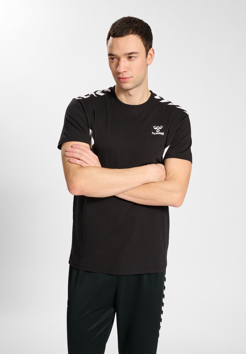 T-Shirt Hummel HmlPeter - Maglia In Cotone Con Stampa Logo Ape, Vestibilità Regolare, Uomo E Donna - Foto 12