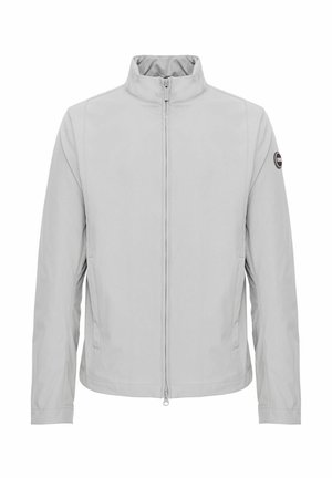 Világosszürke, magas nyakú dzseki teljes elülső cipzárral, hosszú ujjakkal, oldalzsebekkel és kör alakú logófolttal a bal felső karon.